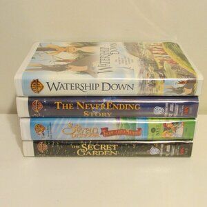 VHS Tapes - 4 Warner Brothers Family movies